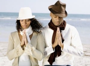 Providence Life Coach: Dating First Impressions - Couple meditating on the beach