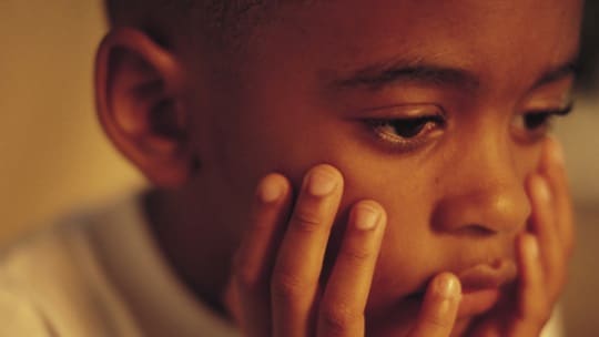 Listen To Their Story - Ex-CIA Undercover Officer - sad-child-boy hands on face