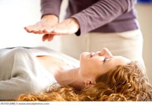 Second Degree Reiki Training at Providence Zen Center - Providence Life Coaching Reiki Counseling - Woman receiving reiki treatment.